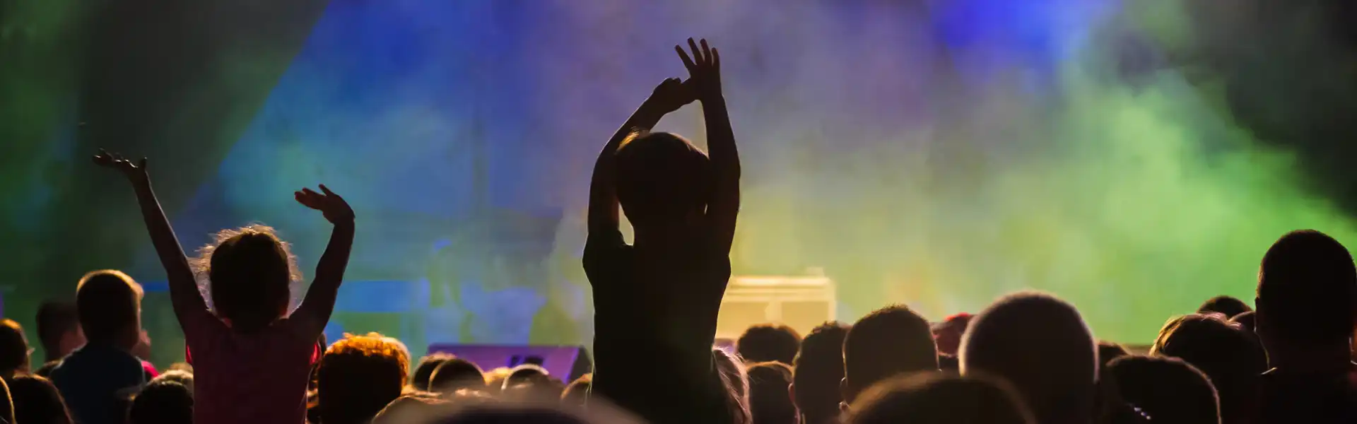kids cheering at the stage
