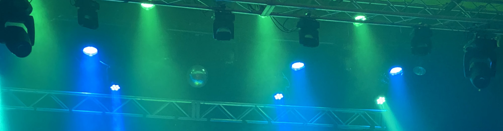 blue and green theater stage lights Tuscaloosa